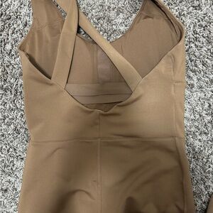 Alo onesie never used but I removed the tags